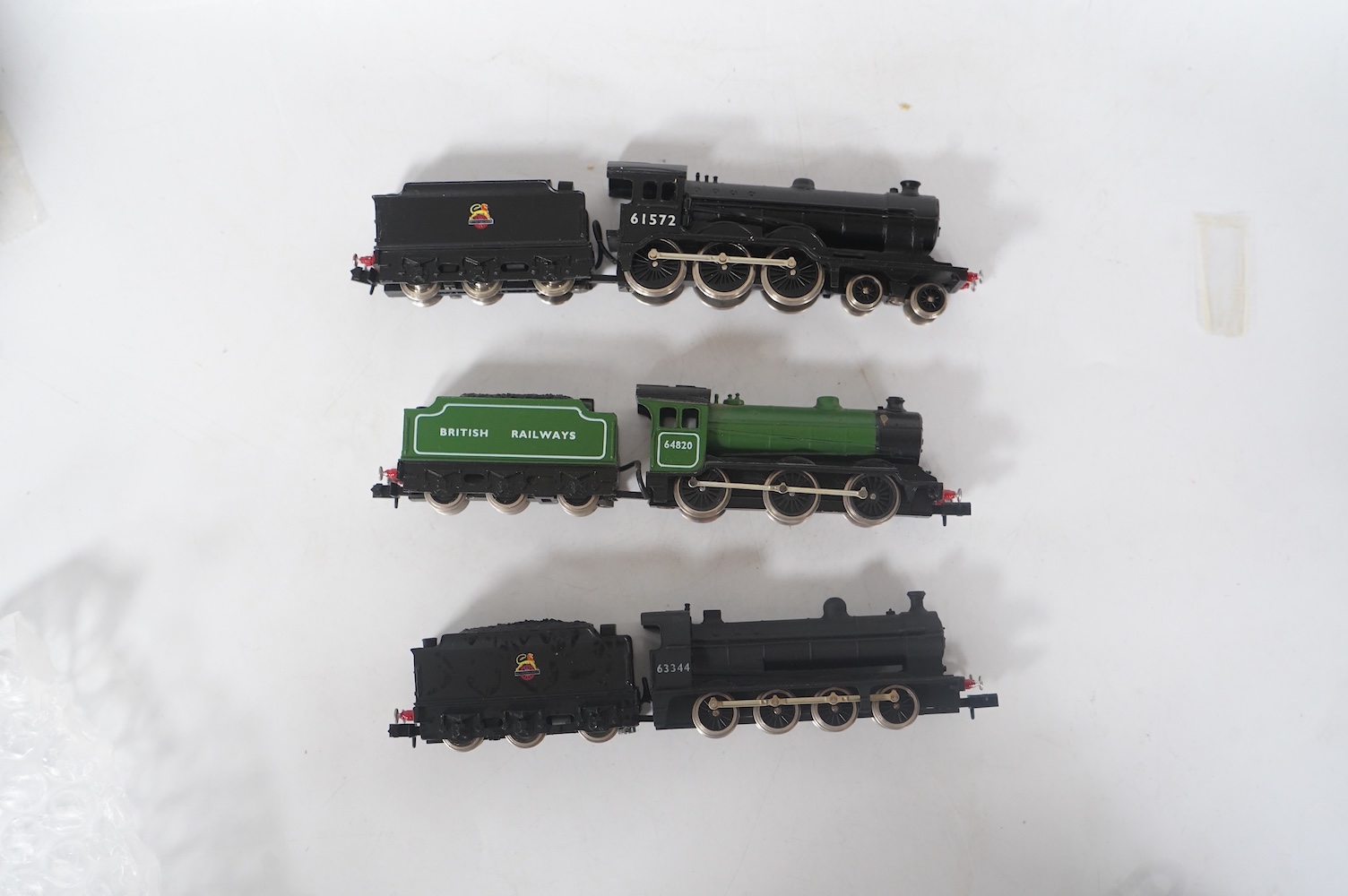 Three boxed Union Mills Models N gauge railway BR locomotives; a Class B12/3, 61572, a Class J39, 64820, and a Class Q2, 63344. Condition - good.